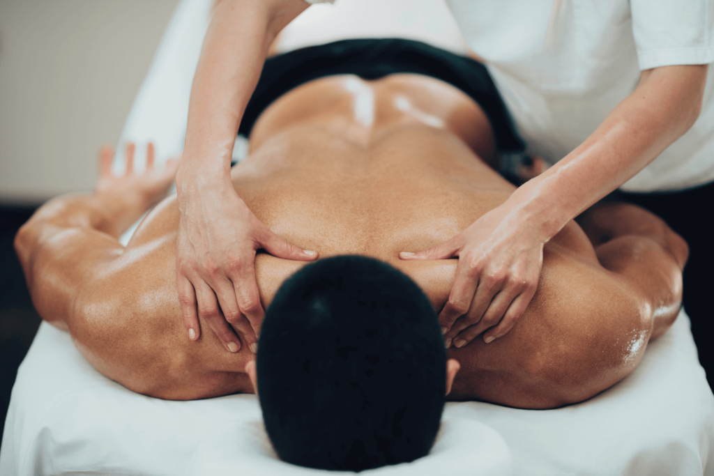 A relaxing back massage being performed on a client at a spa.