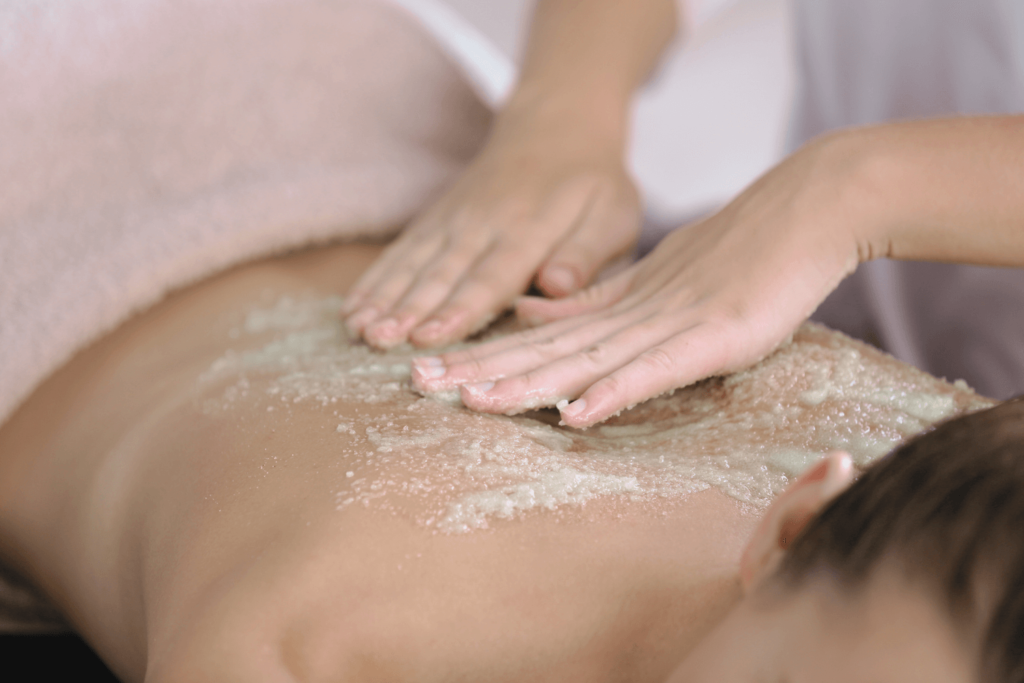A body polishing treatment being performed at BossBeautyBar