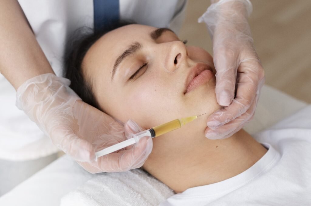 A woman receiving a Glutathione injection for skin and body rejuvenation.